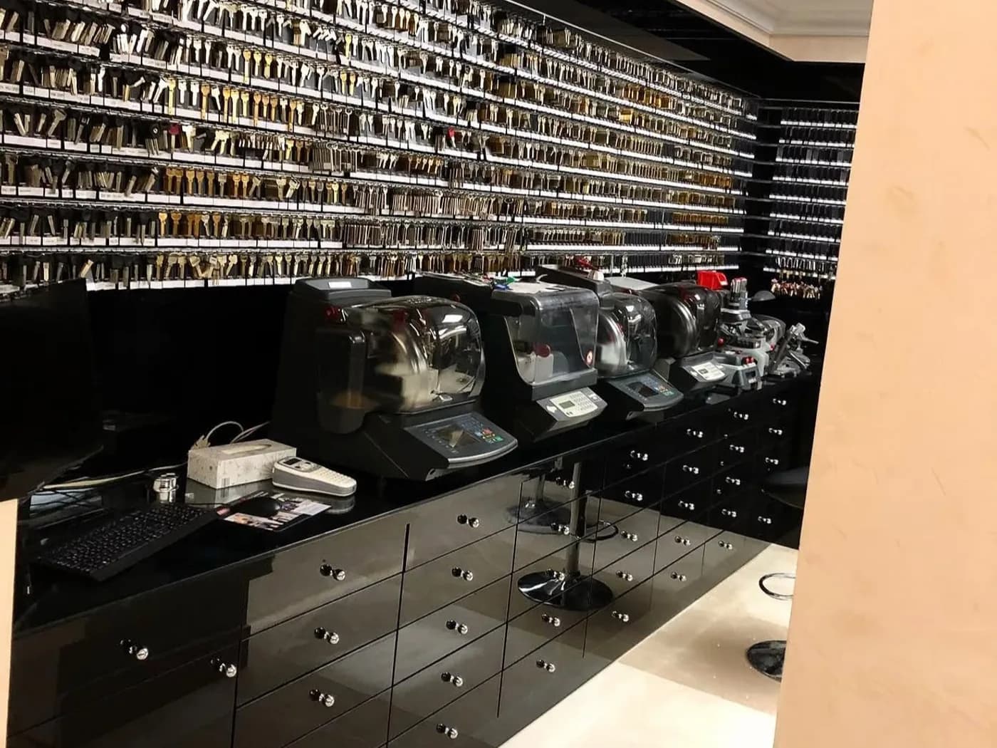 Wall system for key blanks above a high-gloss counter