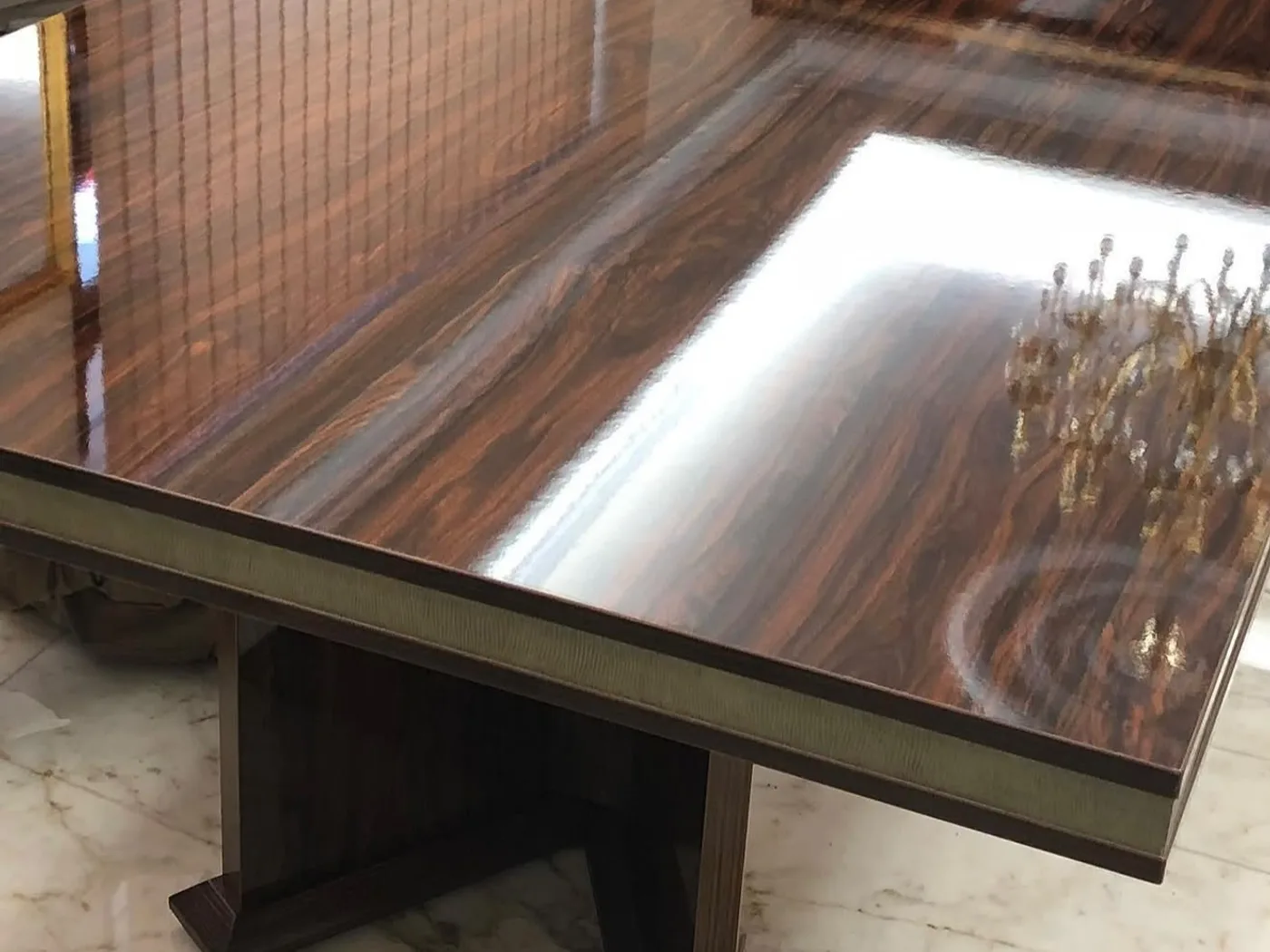 Desk edge with brass profile, detail