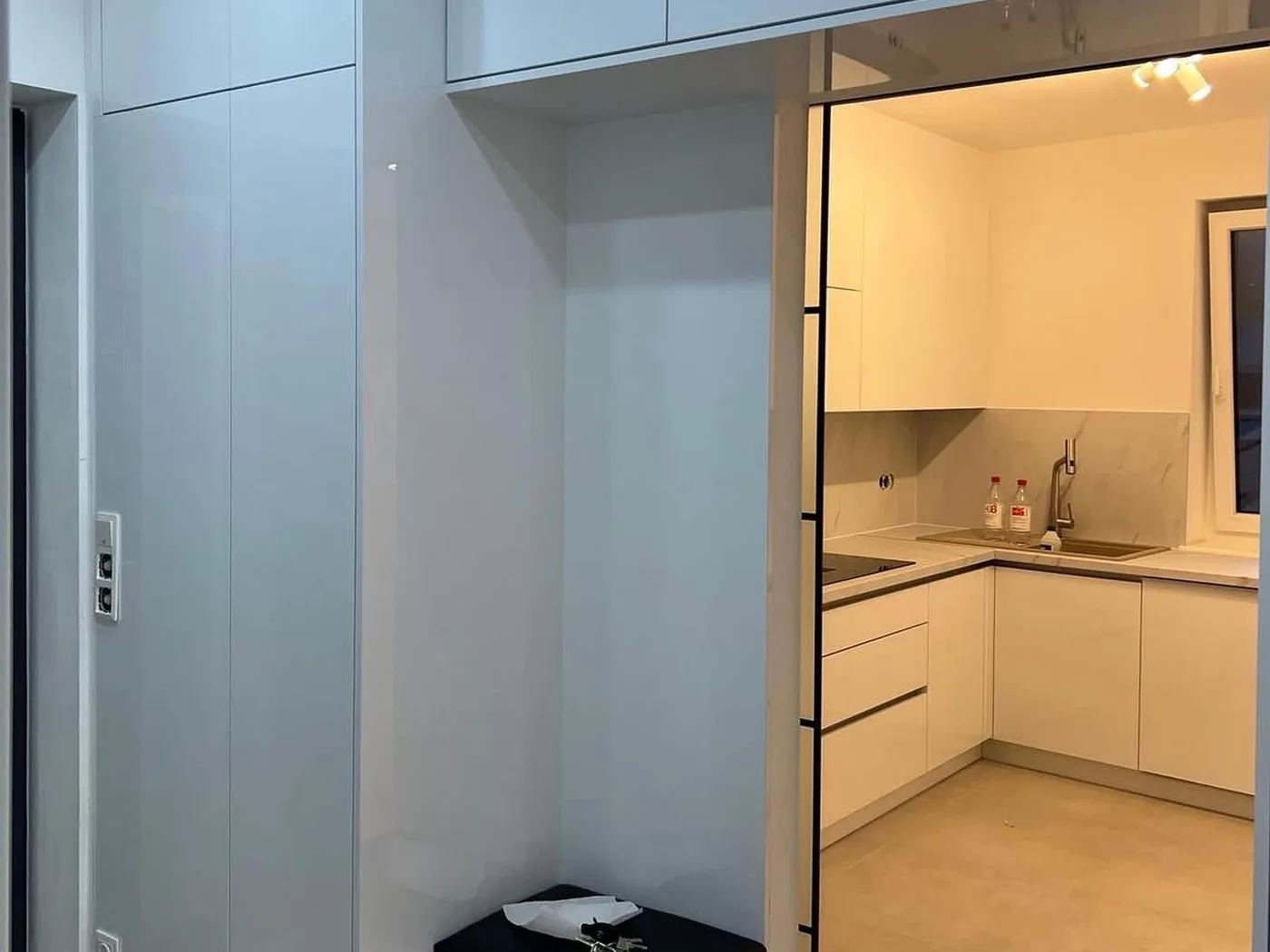 White high-gloss hallway unit with bench